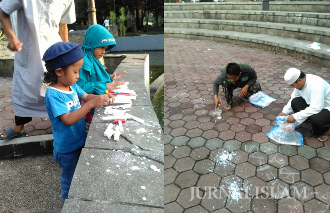Warga Semarang Bersihkan Sampah Lilin Bekas Aksi Pendukung Ahok